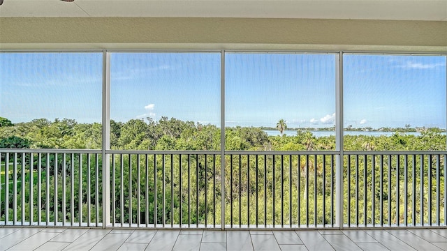 250 Hidden Bay Dr Unit 302, Osprey, FL 34229 - unfurnished sunroom featuring plenty of natural light