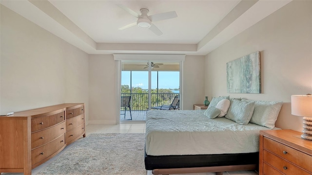 250 Hidden Bay Dr Unit 302, Osprey, FL 34229 - bedroom featuring access to outside, light tile patterned flooring, and a ceiling fan