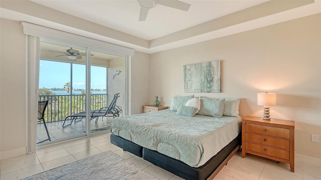 250 Hidden Bay Dr Unit 302, Osprey, FL 34229 - bedroom with access to exterior and a ceiling fan