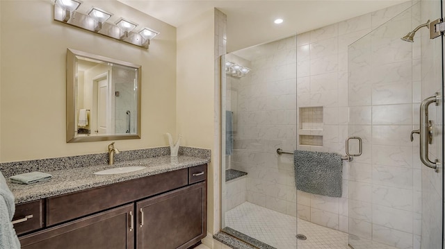 250 Hidden Bay Dr Unit 302, Osprey, FL 34229 - bathroom with vanity and a shower stall