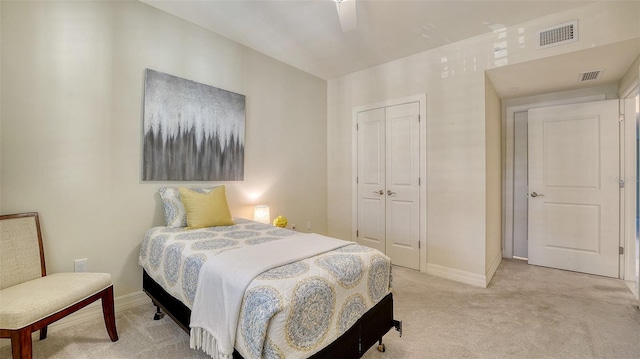 250 Hidden Bay Dr Unit 302, Osprey, FL 34229 - bedroom with light colored carpet, a closet, and ceiling fan