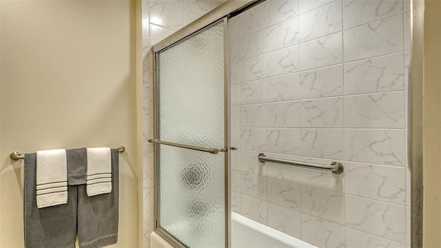 250 Hidden Bay Dr Unit 302, Osprey, FL 34229 - bathroom featuring bath / shower combo with glass door