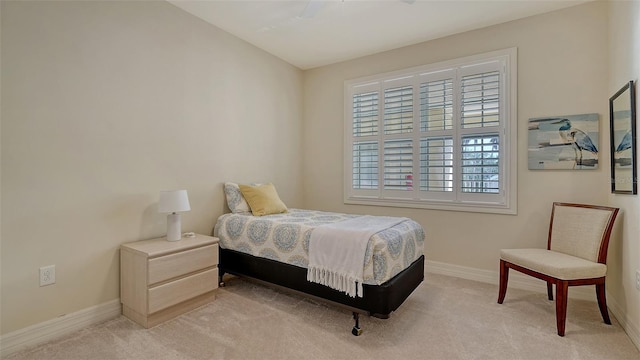 250 Hidden Bay Dr Unit 302, Osprey, FL 34229 - bedroom with baseboards and light colored carpet