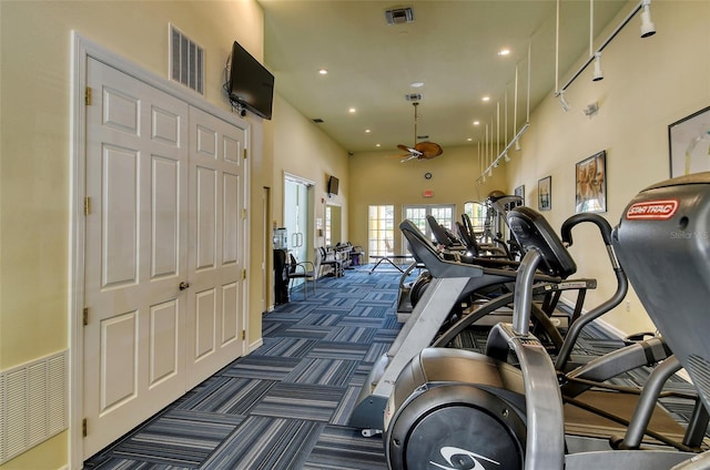 250 Hidden Bay Dr Unit 302, Osprey, FL 34229 - exercise room featuring dark colored carpet and recessed lighting