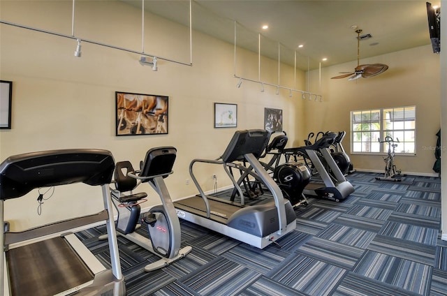 250 Hidden Bay Dr Unit 302, Osprey, FL 34229 - gym featuring a high ceiling, a ceiling fan, dark carpet, and recessed lighting