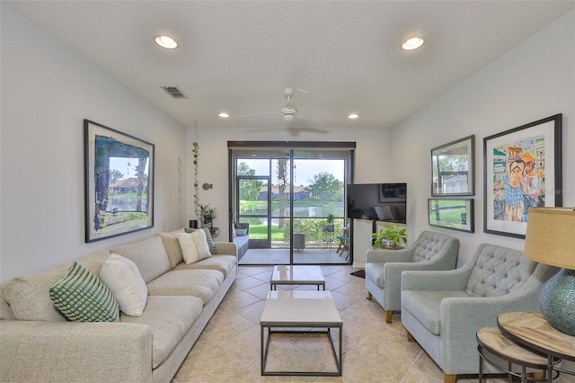 7344 Skybird Rd, Bradenton, FL 34209 - living area with recessed lighting, a ceiling fan, and light tile patterned floors