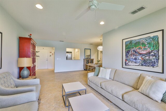 7344 Skybird Rd, Bradenton, FL 34209 - living area with light tile patterned floors, ceiling fan, and recessed lighting