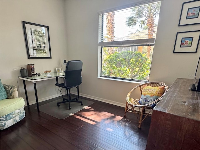 7344 Skybird Rd, Bradenton, FL 34209 - home office with wood finished floors and plenty of natural light