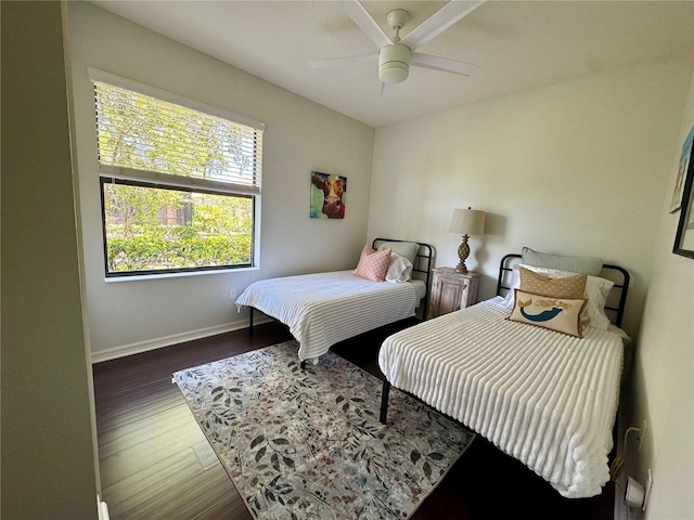 7344 Skybird Rd, Bradenton, FL 34209 - bedroom with wood finished floors and ceiling fan