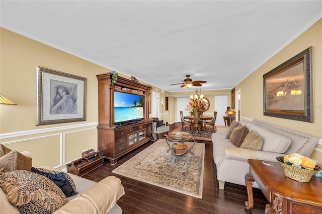 5855 Midnight Pass Rd Unit 416, Sarasota, FL 34242 - living area featuring dark wood finished floors, ceiling fan, wainscoting, crown molding, and a decorative wall