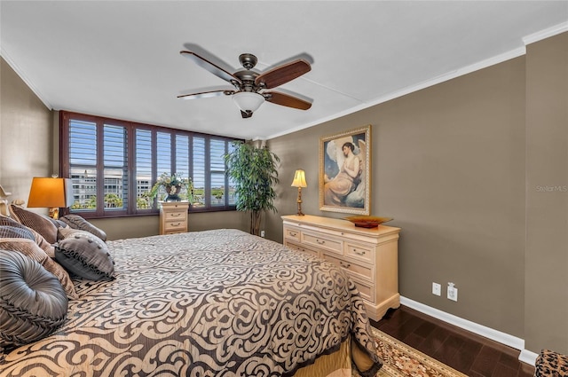5855 Midnight Pass Rd Unit 416, Sarasota, FL 34242 - bedroom with dark wood-style flooring, crown molding, and ceiling fan