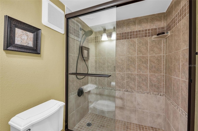 5855 Midnight Pass Rd Unit 416, Sarasota, FL 34242 - bathroom featuring toilet and a tile shower