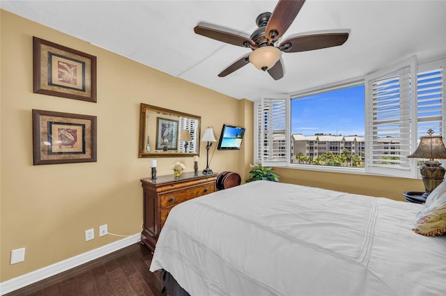 5855 Midnight Pass Rd Unit 416, Sarasota, FL 34242 - bedroom with wood finished floors and ceiling fan