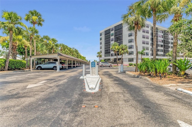 5855 Midnight Pass Rd Unit 416, Sarasota, FL 34242 - view of apartment building / complex with covered parking