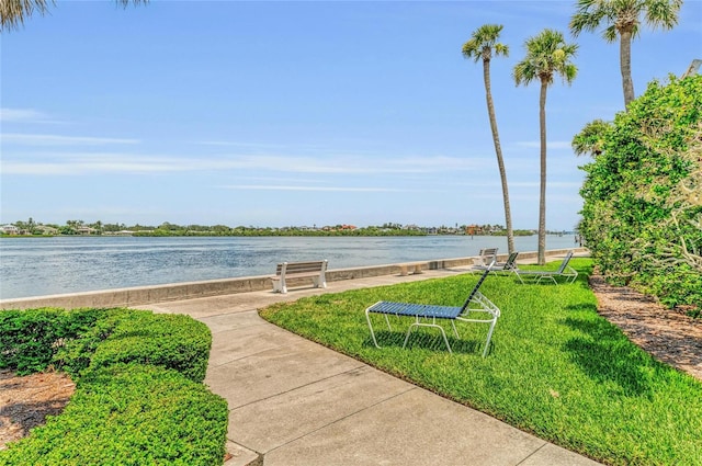 5855 Midnight Pass Rd Unit 416, Sarasota, FL 34242 - surrounding community featuring a water view and a lawn