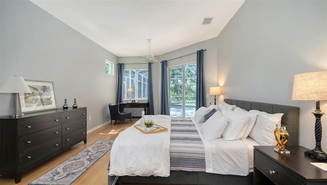 6206 Stillwater Ct, University Park, FL 34201 - bedroom featuring access to outside and light wood-style flooring