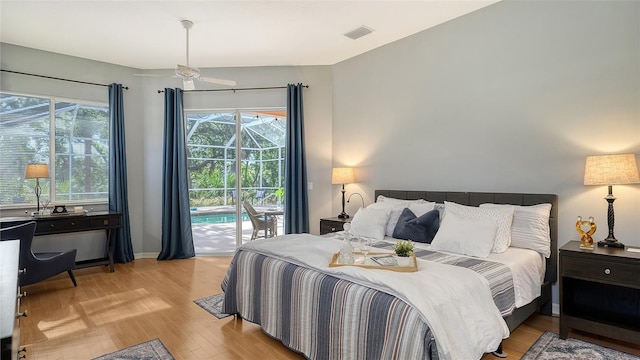 6206 Stillwater Ct, University Park, FL 34201 - bedroom featuring access to exterior and light wood finished floors