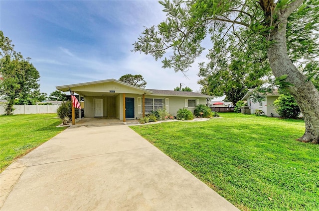 237 Saxon Cir, Venice, FL 34293 - ranch-style house featuring driveway and a carport