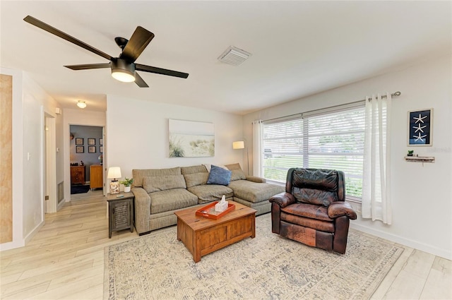 237 Saxon Cir, Venice, FL 34293 - living room featuring ceiling fan and light wood finished floors