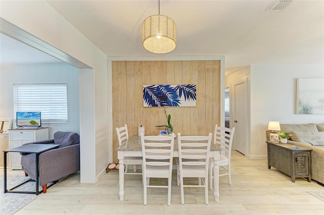 237 Saxon Cir, Venice, FL 34293 - dining space featuring wood finished floors and wooden walls