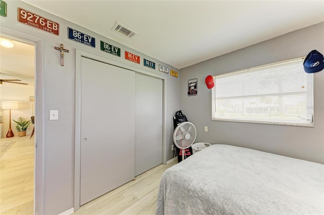 237 Saxon Cir, Venice, FL 34293 - bedroom featuring wood finished floors and a closet