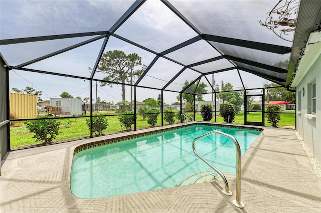 237 Saxon Cir, Venice, FL 34293 - swimming pool featuring a lawn and a patio