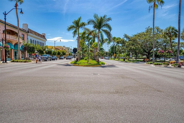 237 Saxon Cir, Venice, FL 34293 - view of asphalt road featuring street lighting, curbs, and sidewalks