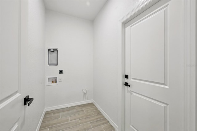 2523 Hagerick Ln, North Port, FL 34288 - washroom featuring electric dryer hookup, hookup for a washing machine, and wood finish floors