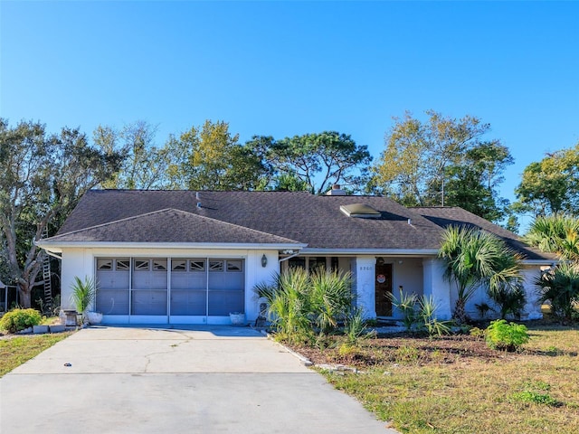8260 Berkeley Manor Blvd, Spring Hill, FL 34606 - view of front of property with stucco siding, concrete driveway, a garage, and a shingled roof