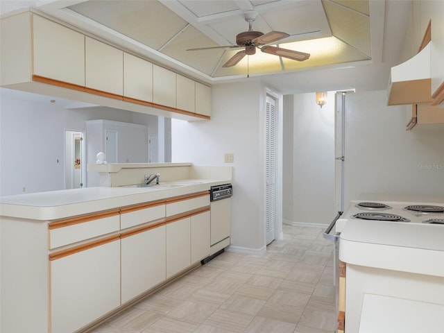 8260 Berkeley Manor Blvd, Spring Hill, FL 34606 - kitchen with white appliances, ventilation hood, ceiling fan, light countertops, and a peninsula