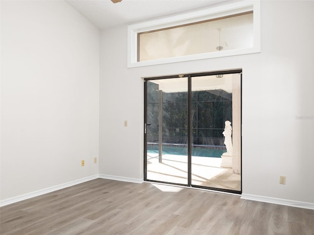 8260 Berkeley Manor Blvd, Spring Hill, FL 34606 - spare room with wood finished floors and plenty of natural light