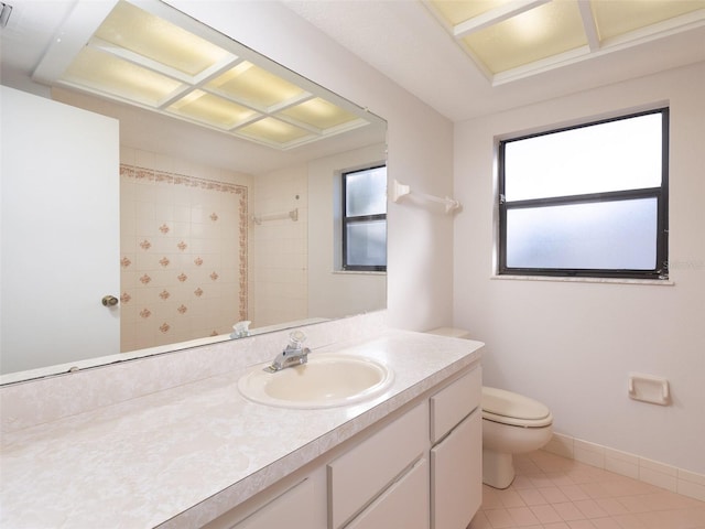 8260 Berkeley Manor Blvd, Spring Hill, FL 34606 - bathroom featuring vanity, tile patterned flooring, and a tile shower