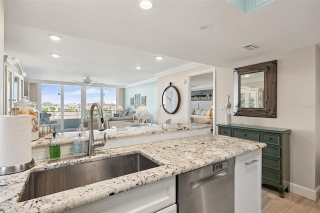 6415 Midnight Pass Rd Unit 502, Sarasota, FL 34242 - kitchen featuring stainless steel dishwasher, open floor plan, a ceiling fan, light stone counters, and recessed lighting