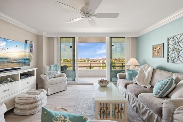 6415 Midnight Pass Rd Unit 502, Sarasota, FL 34242 - living room with wood finished floors, crown molding, and a ceiling fan