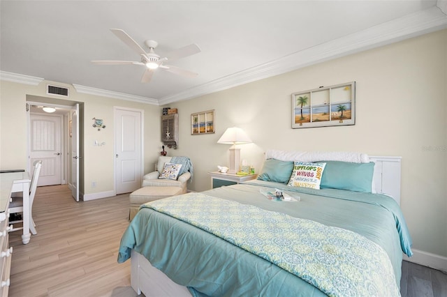 6415 Midnight Pass Rd Unit 502, Sarasota, FL 34242 - bedroom with crown molding, light wood-style floors, and ceiling fan