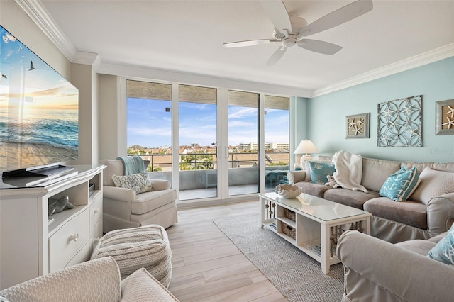 6415 Midnight Pass Rd Unit 502, Sarasota, FL 34242 - living area with crown molding, a ceiling fan, and light wood-style flooring