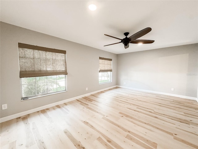 4913 32nd St E, Bradenton, FL 34203 - empty room with ceiling fan and wood finished floors