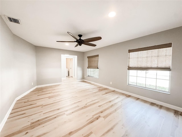 4913 32nd St E, Bradenton, FL 34203 - spare room featuring plenty of natural light, light wood-style floors, ceiling fan, and recessed lighting