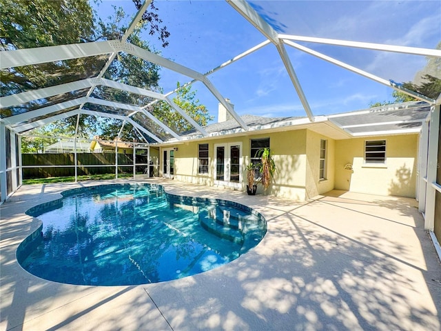 4913 32nd St E, Bradenton, FL 34203 - view of swimming pool with french doors, a patio area, and a lanai