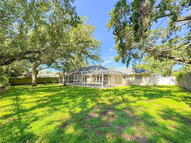 4913 32nd St E, Bradenton, FL 34203 - fenced backyard with glass enclosure