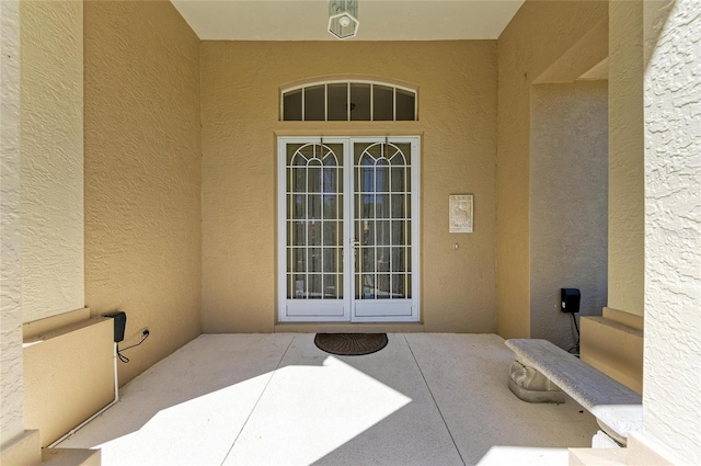 8315 Eagle Xing, Sarasota, FL 34241 - property entrance featuring stucco siding and a patio