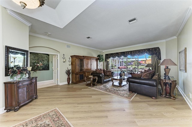 8315 Eagle Xing, Sarasota, FL 34241 - living area with crown molding and light wood-style floors