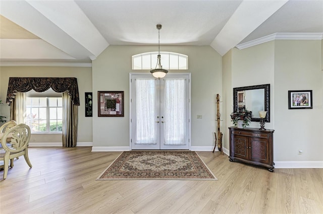 8315 Eagle Xing, Sarasota, FL 34241 - foyer entrance with french doors, light wood finished floors, high vaulted ceiling, and ornamental molding