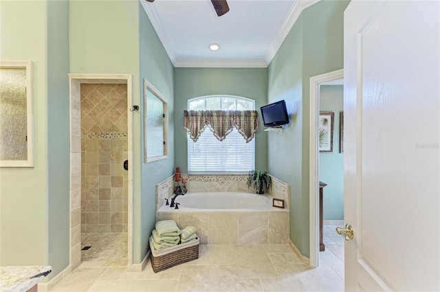8315 Eagle Xing, Sarasota, FL 34241 - bathroom featuring crown molding, a garden tub, a tile shower, tile patterned flooring, and a ceiling fan