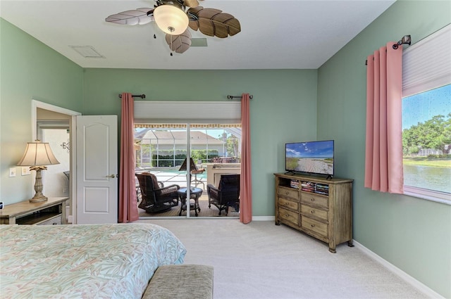 8315 Eagle Xing, Sarasota, FL 34241 - bedroom featuring carpet floors, multiple windows, and a ceiling fan
