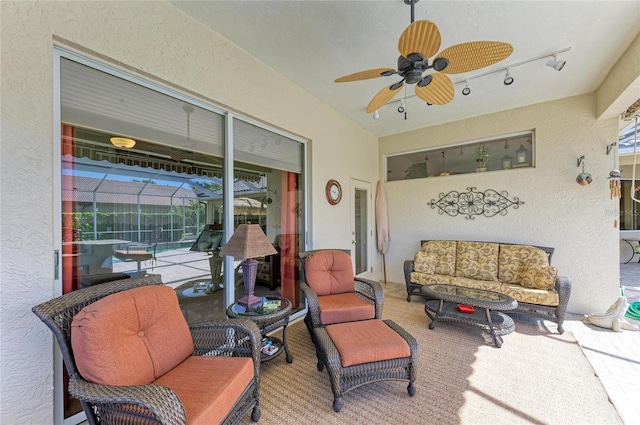 8315 Eagle Xing, Sarasota, FL 34241 - view of patio / terrace featuring outdoor lounge area, a ceiling fan, and a lanai