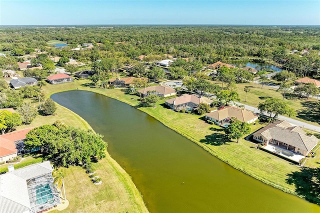 8315 Eagle Xing, Sarasota, FL 34241 - aerial perspective of suburban area with a large body of water and a heavily wooded area