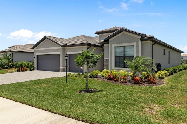 4961 Seafoam Trl, Bradenton, FL 34211 - single story home featuring a garage, decorative driveway, stucco siding, and a front yard