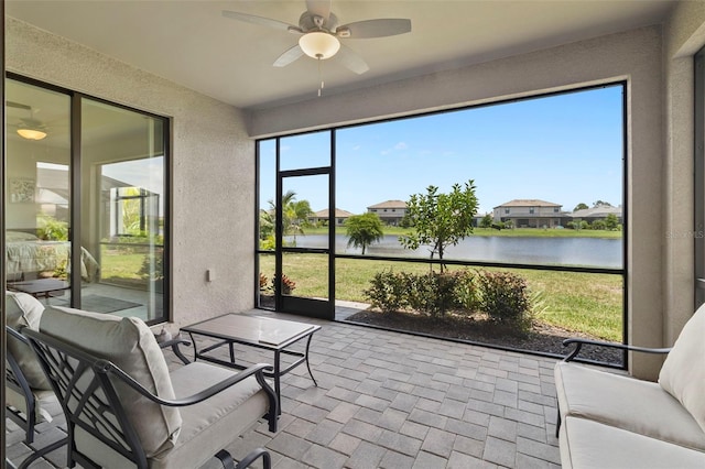 4961 Seafoam Trl, Bradenton, FL 34211 - sunroom / solarium featuring a water view and ceiling fan