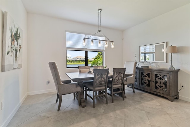 4961 Seafoam Trl, Bradenton, FL 34211 - dining space featuring healthy amount of natural light and light tile patterned floors
